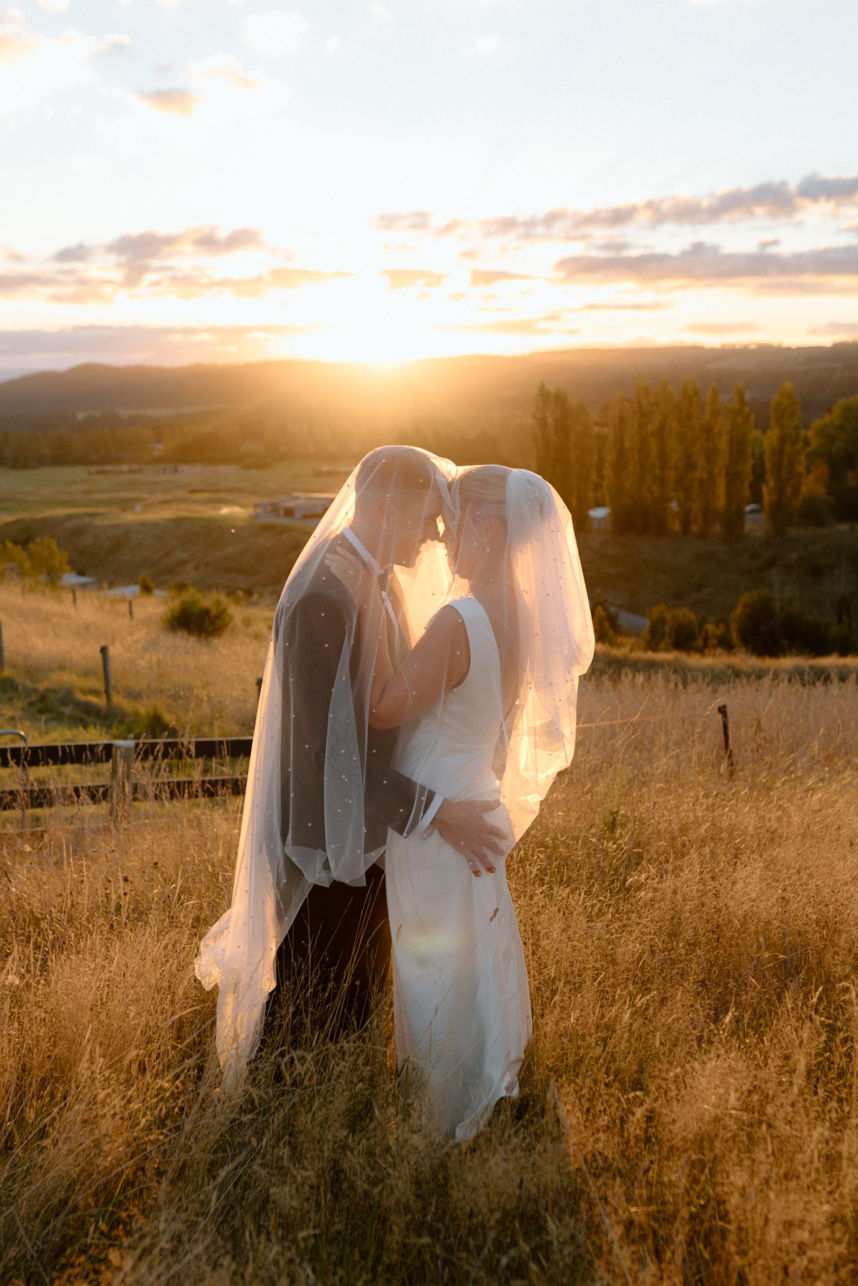 Couple at sunset over Lake Taupō